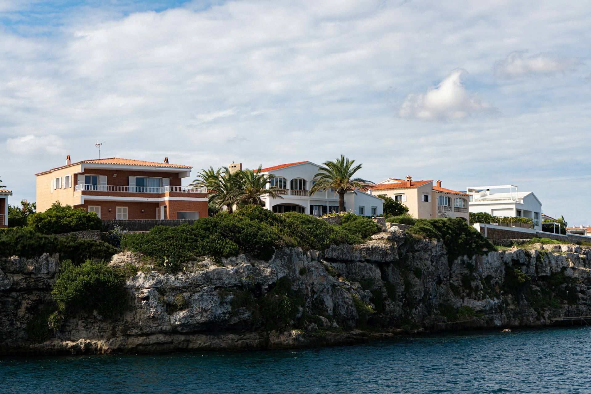 Whitewashed Mediterranean villas on the Spanish coastline — buying property in Spain as a UK citizen in 2026