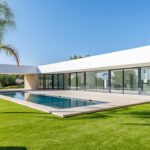 Modern white new-build villa with swimming pool in Spain — buying a new build property on the Costa del Sol