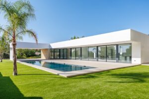 Modern white new-build villa with swimming pool in Spain — buying a new build property on the Costa del Sol