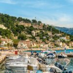Puerto de la Duquesa marina with yachts and Spanish hillside village - Casares Costa property guide for British buyers