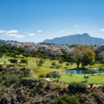 Golf course with mountain backdrop on the Costa del Sol, Andalusia, Spain