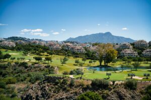 Golf course with mountain backdrop on the Costa del Sol, Andalusia, Spain