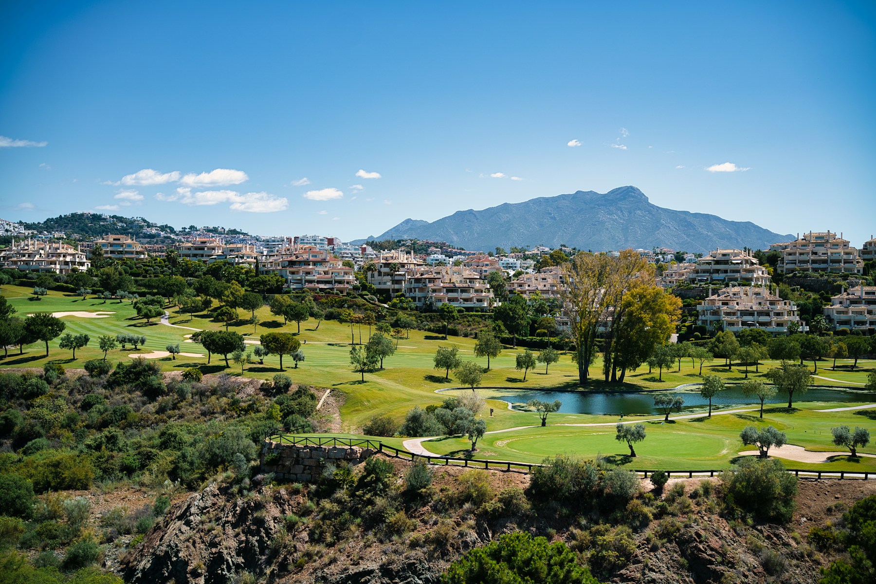 Golf course with mountain backdrop on the Costa del Sol, Andalusia, Spain