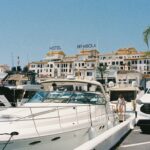 Puerto Banús marina with luxury yachts and Hotel Benabola, Marbella, Costa del Sol