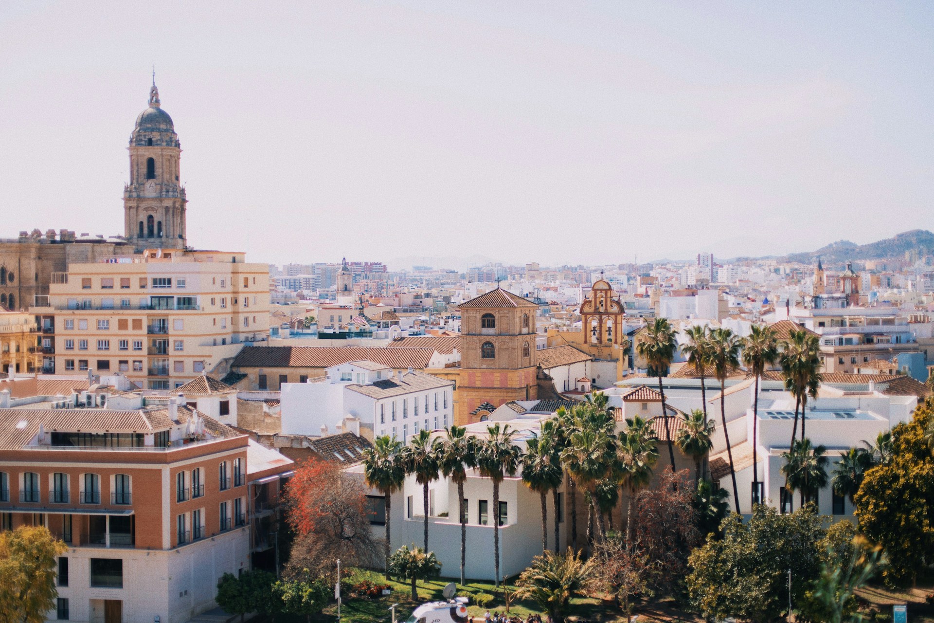 Panoramic view of Malaga city with the port and Mediterranean Sea from the mountains above the city