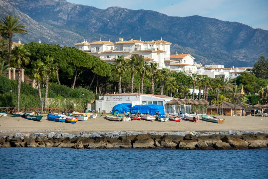 Coastal beach scene in Marbella East, Costa del Sol — Elviria property guide for British buyers