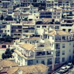 Aerial view of Costa del Sol properties and coastline - negotiating property prices in Spain