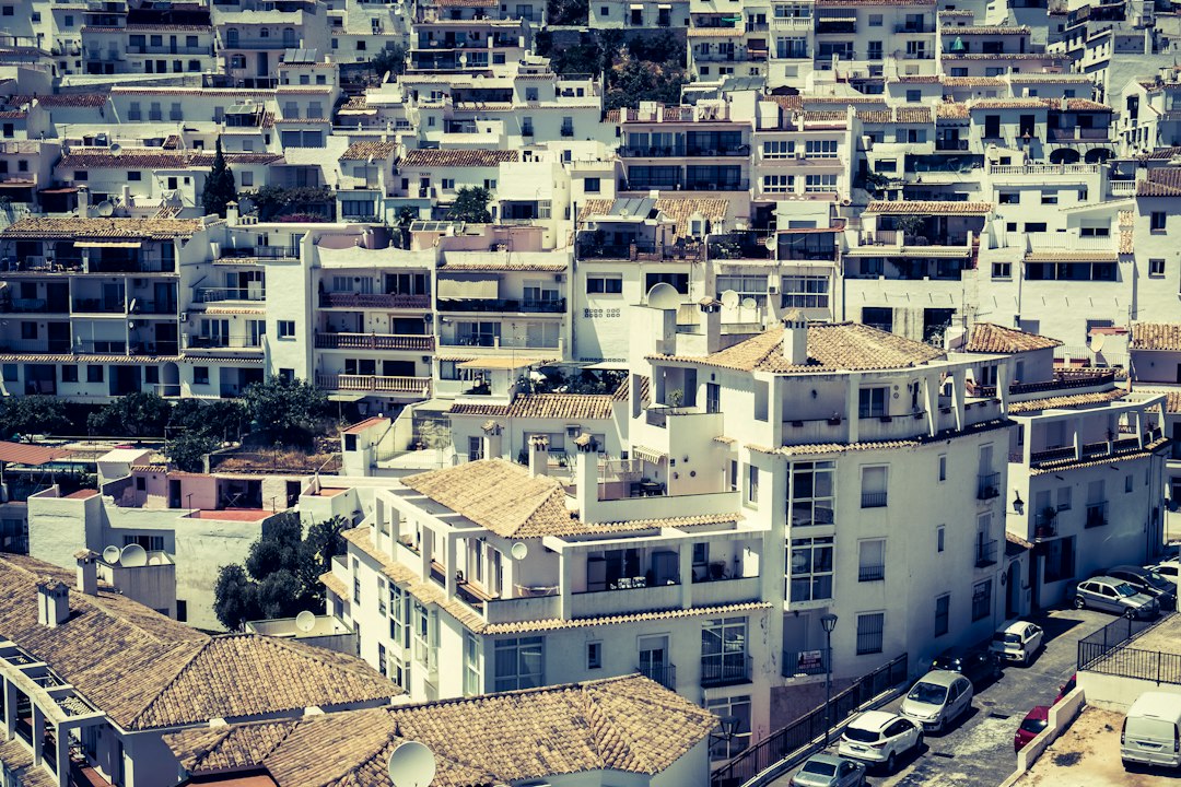 Aerial view of Costa del Sol properties and coastline - negotiating property prices in Spain