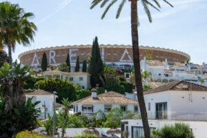 White houses and palm trees on the Costa del Sol — Spanish property purchase tax guide for UK buyers 2026